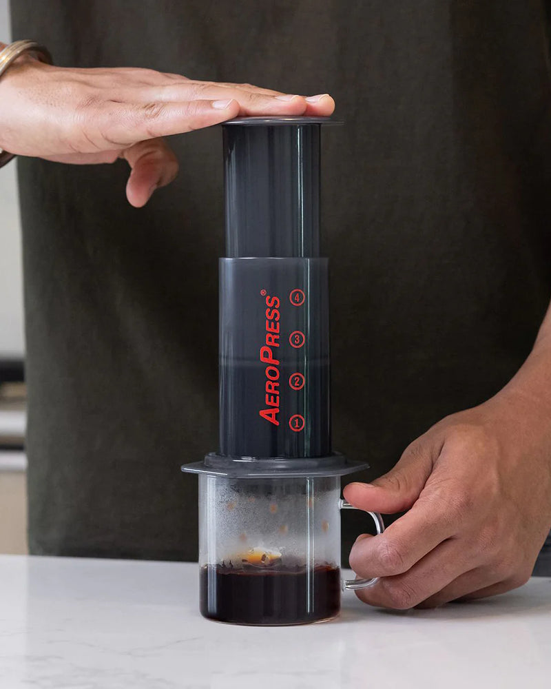 Aeropress plunger top
